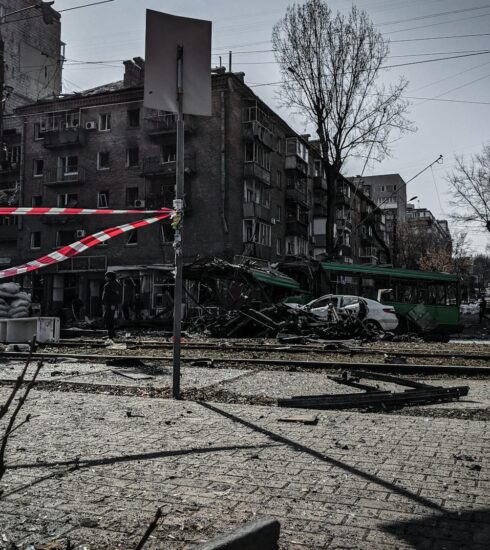 A devastated street in Kyiv showcasing war damage and destruction.